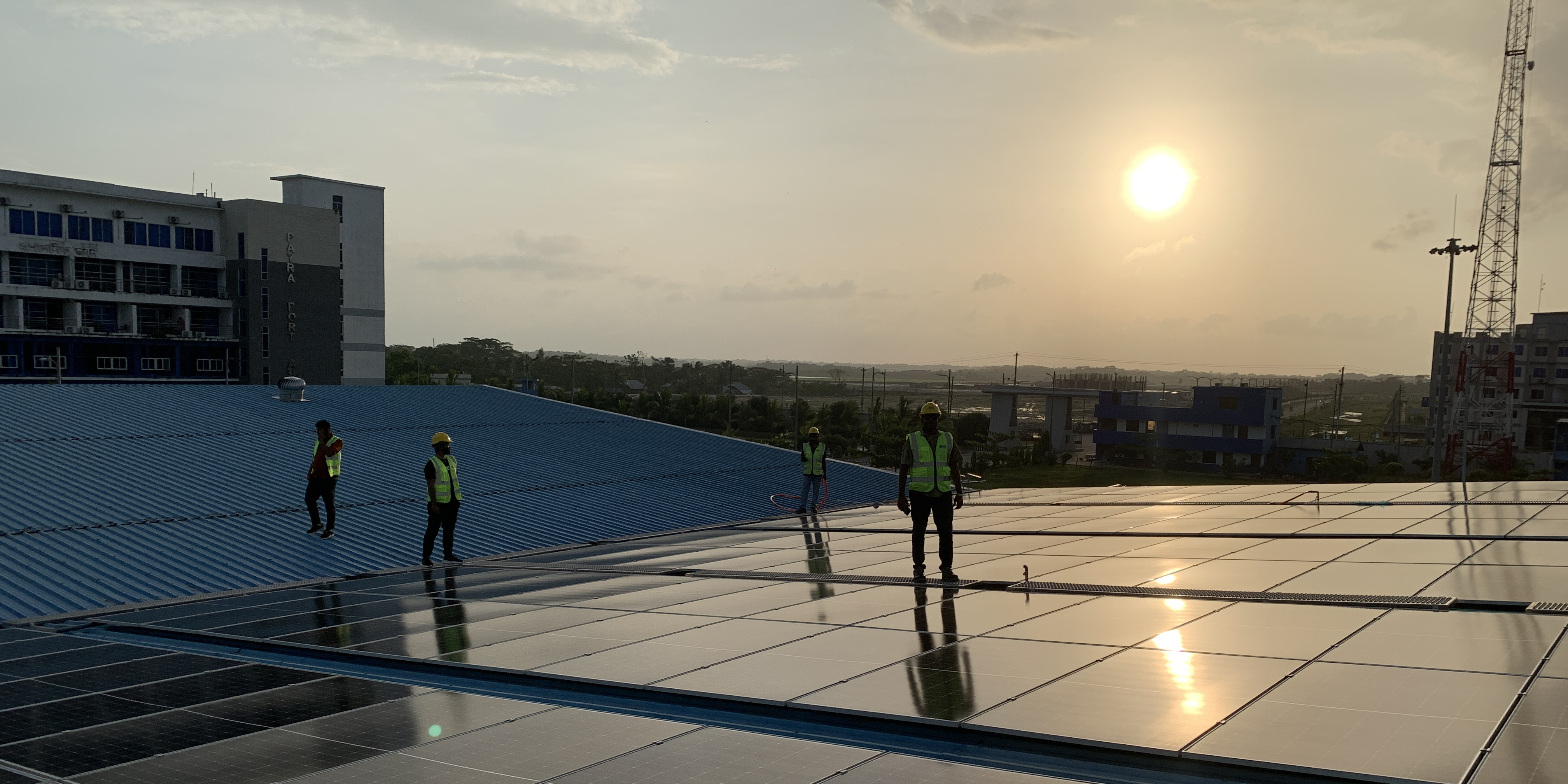 Green Power crew on the completed rooftop array at Payra Port Authority